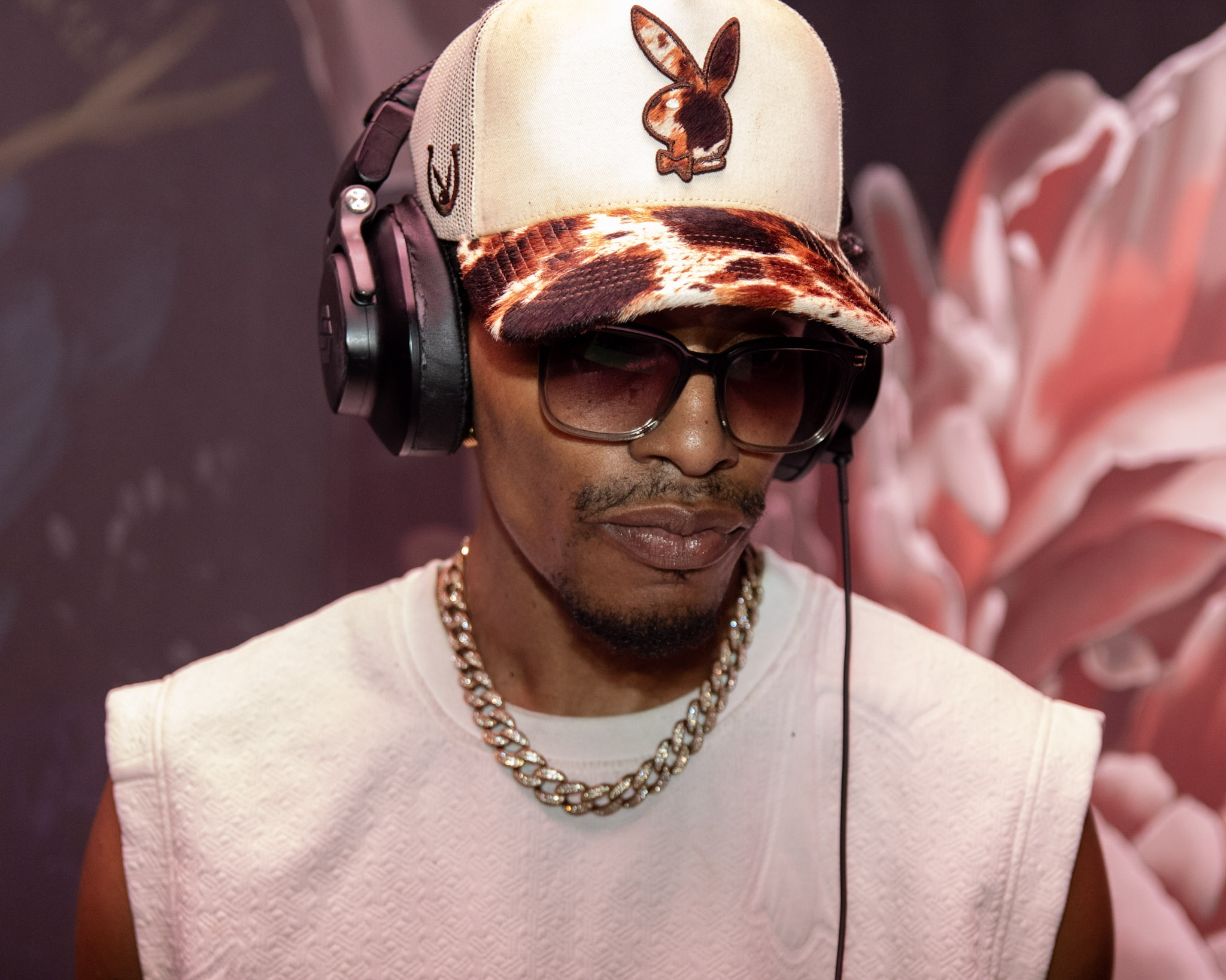 DJ portrait captured in warm event lighting